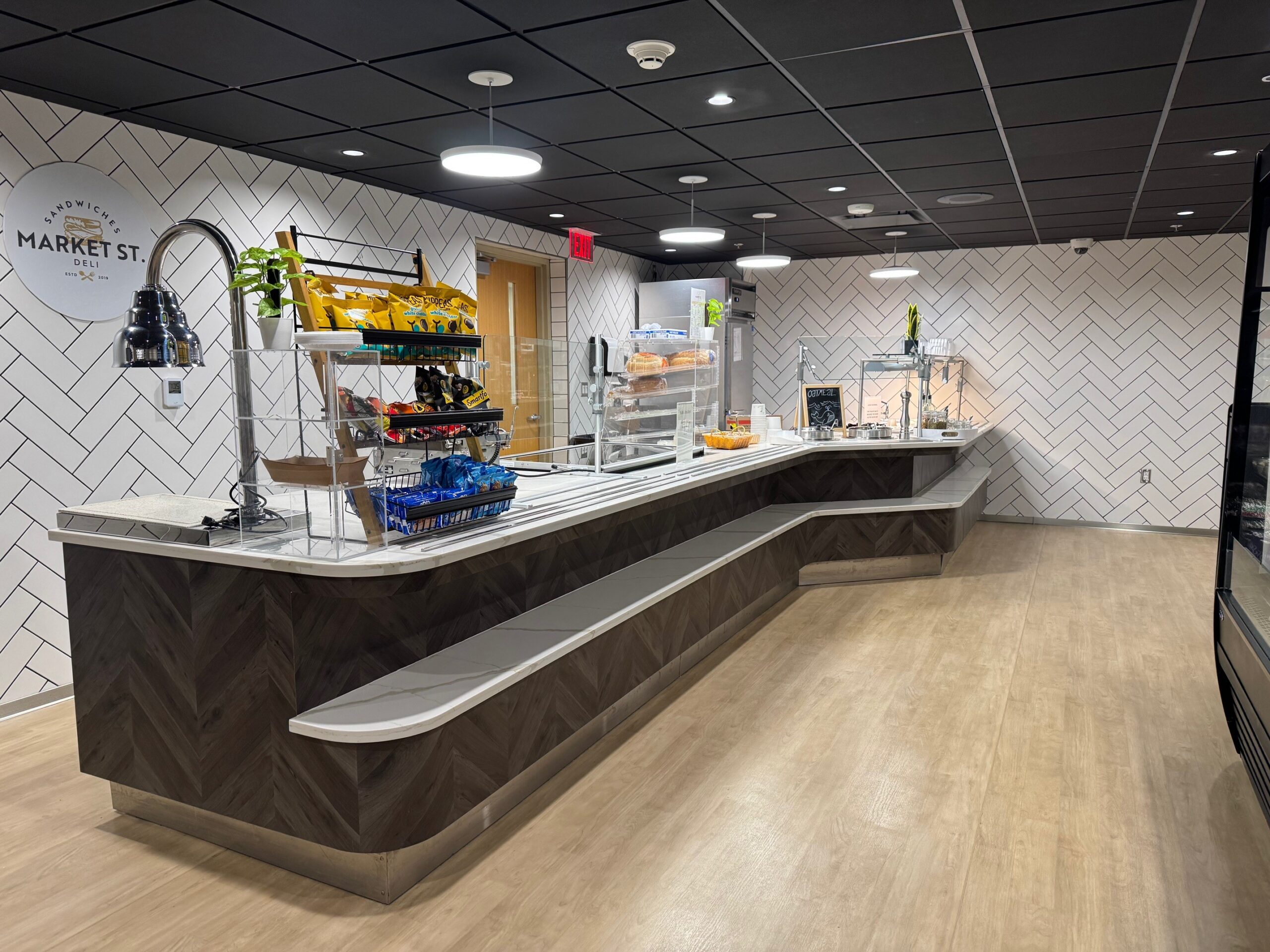 Modern hospital cafeteria at Oaklawn Hospital with seating and food service area.